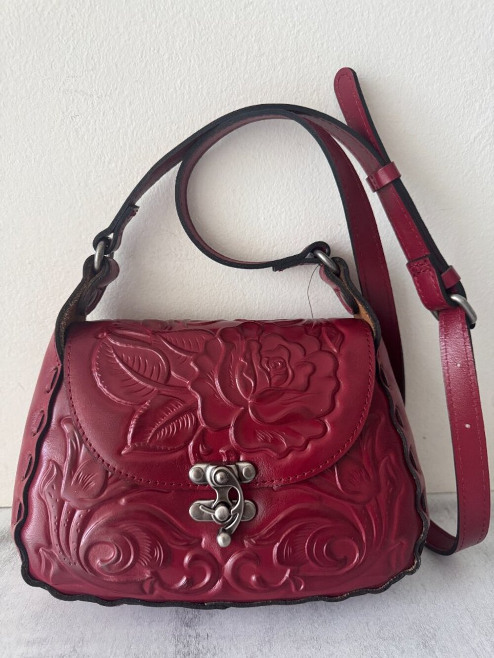 PATRICIA NASH Leather Lucia Tooled Floral Crossbody Berry Red